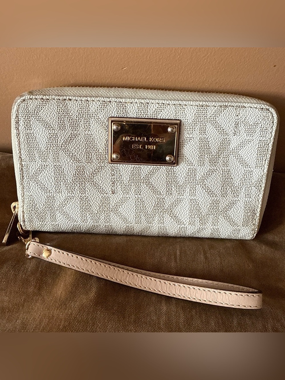 Michael Kors Beige Logo Wristlet with Gold Plaque
